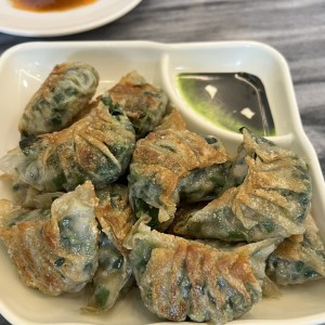 Dumpling de puerco con cebollina