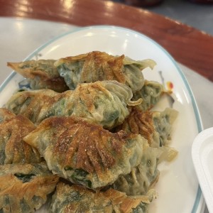 Dumpling de puerco con cebollina