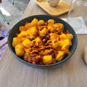 Salty - Golden Spicy Tots con bacon