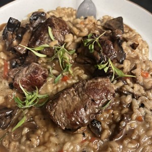 Arroz meloso con filete de res