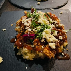 Milanesa de pollo, pure de tuca