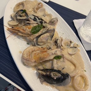 Raviolis ricotta con mariscos