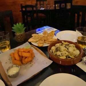 Deditos de Pescado y Almejas en salsa Blanca