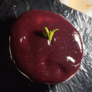 cheese cake con topping de frambuesas