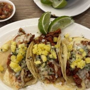 Tacos al Pastor con queso