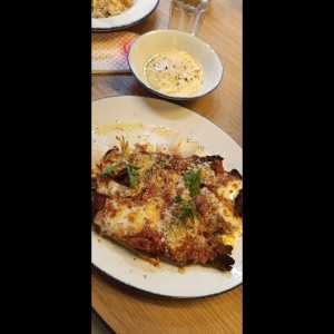 SECONDI PIATTI - MILANESA DE POLLO A LA PARMIGIANA