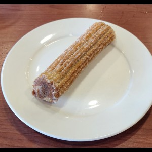 churro relleno de Manjar