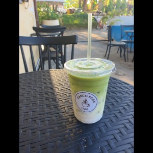Iced matcha latte with almond milk