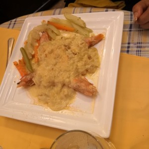 langostino con centollo gratinado