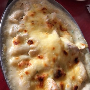 Gnoccis de pollo gratinados