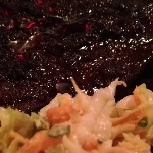 Costilla y ensalada de col