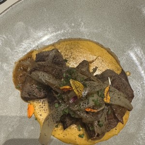 Bistec encebollado