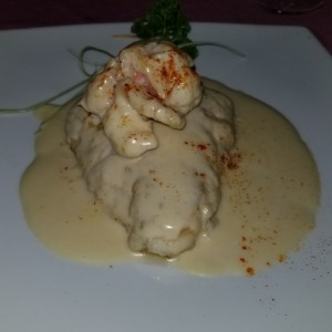 pescado en salsa de langosta