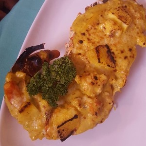 Langosta con salsa de curry y coco.
