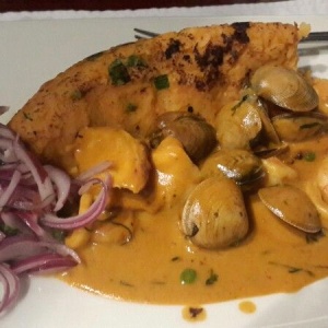 Tacu tacu con Mariscos  Picantes