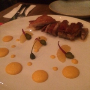 cochinillo en pure de naranja 