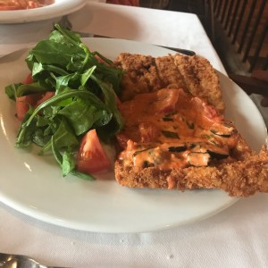 milanesa con aceitunas y tomates secos