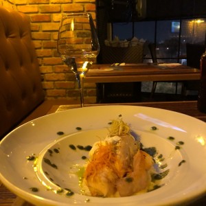 Covina sobre pure de yuca