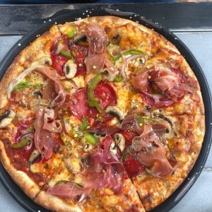 Pizza con masa de orégano