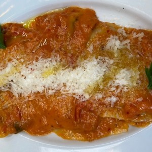 TORTELI DI MAIALE AL VODKA cerdo estofado en salsa al vodka 