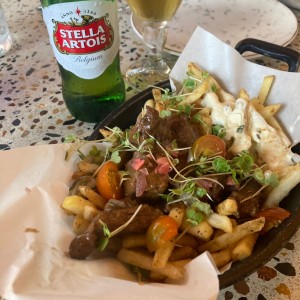 Frites con estofado