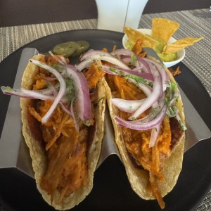 Tacos de cochinilla