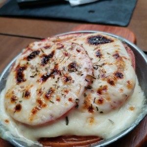 Tomate con queso