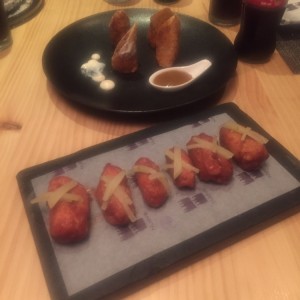 alitas y lumpias de pato