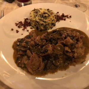 Conejo y risotto