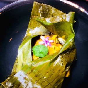 Pescado con caracoles y arroz con coco
