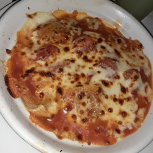 raviolis de carne gratinados