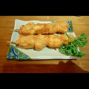 Pinchos de cerdo y cebolla