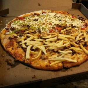Pizza de Parrilla y Taco