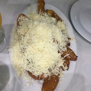 Tajadas al horno (Con queso rallado)