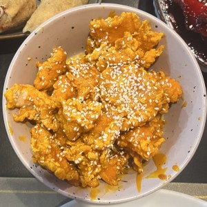 Pollo con miel y ajonjolí