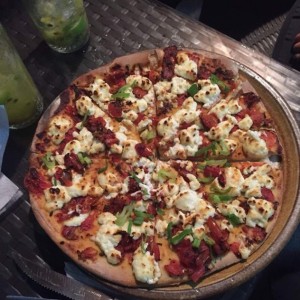 pizza d tomates secos con queso de cabra