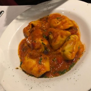 torteloni con espinaca a la sicciliana