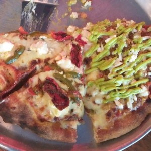 Pizza de tomates secos y taco