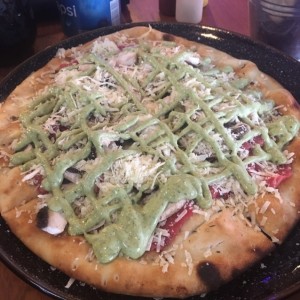 pizza con carpaccio de lomito