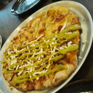 Puzza de Taco mexicano con Pizza Cuatro quesos son chistorras