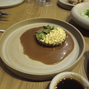 Tartaleta de cebolla confitada y queso de oveja