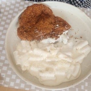 Cotoletta de cerdo con pasta a la crema 