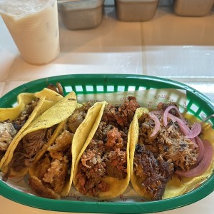 Taco carnitas, birria, chicharron guisado, campechano y cochinita