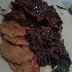Lechon, tostones y congri