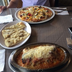 pizza vegetariana y pasticho