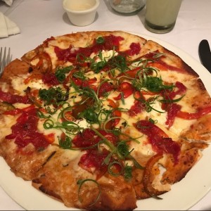 Pizza de tomates asados