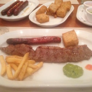 punta con racion de chistorra, milo frito y papas..