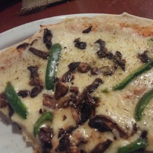 Pizza con muchisimo queso.
