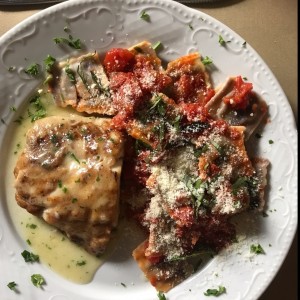 Robalo con raviolis de berenjena al fileto