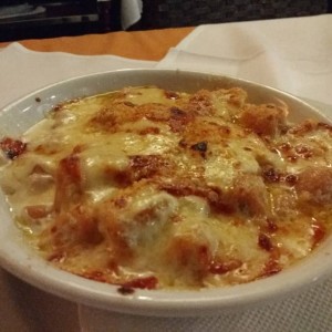 Nnoquis de batata al graten